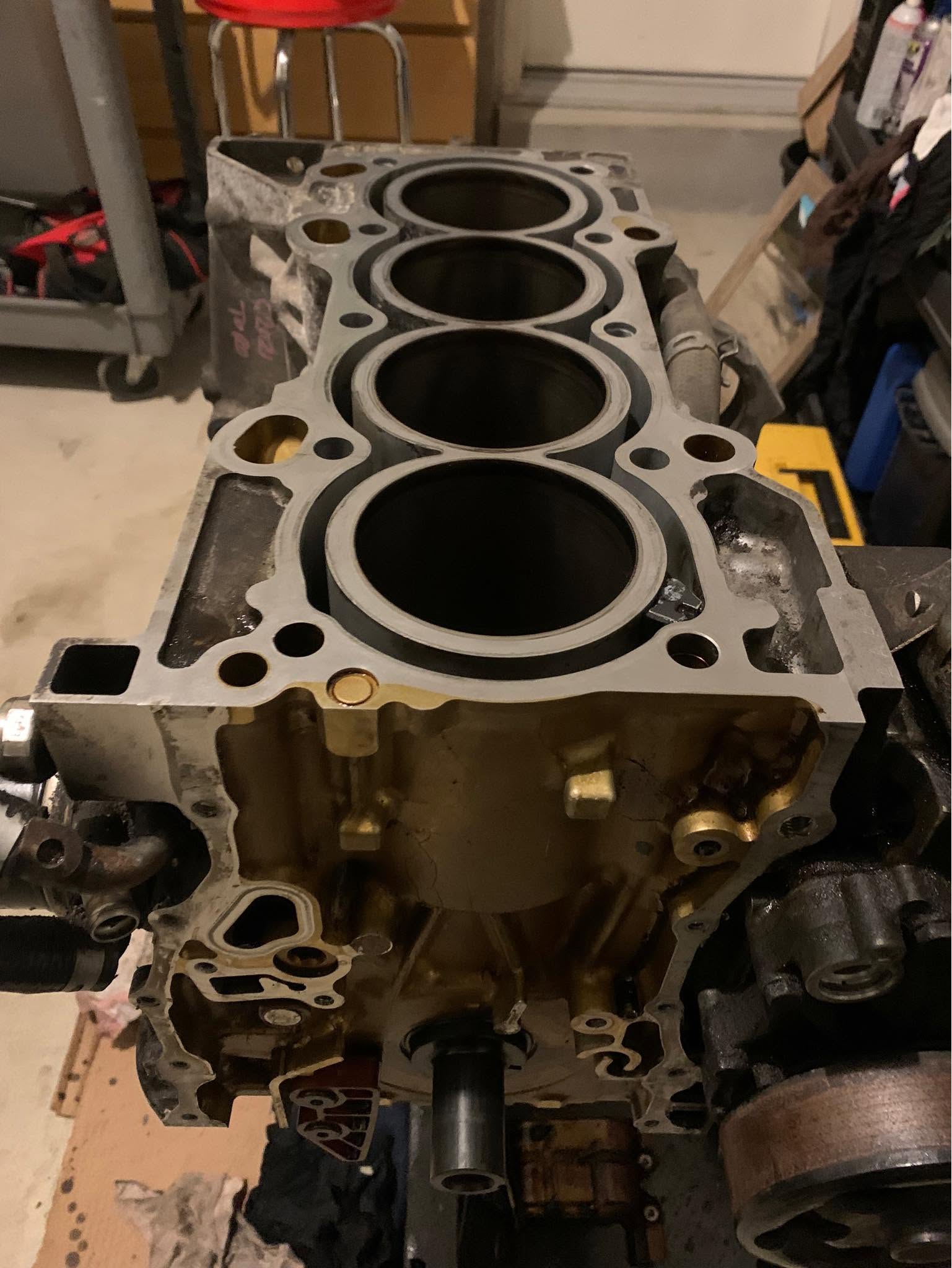 Engine block prepared for precision machine work and assembly