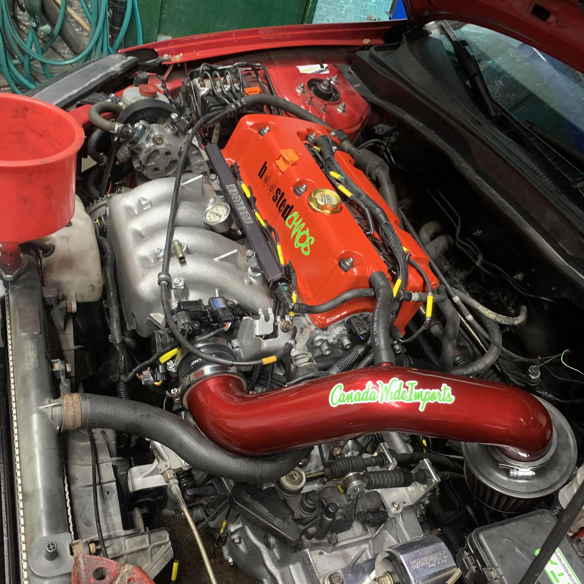 Mechanic completing custom work inside a vehicle