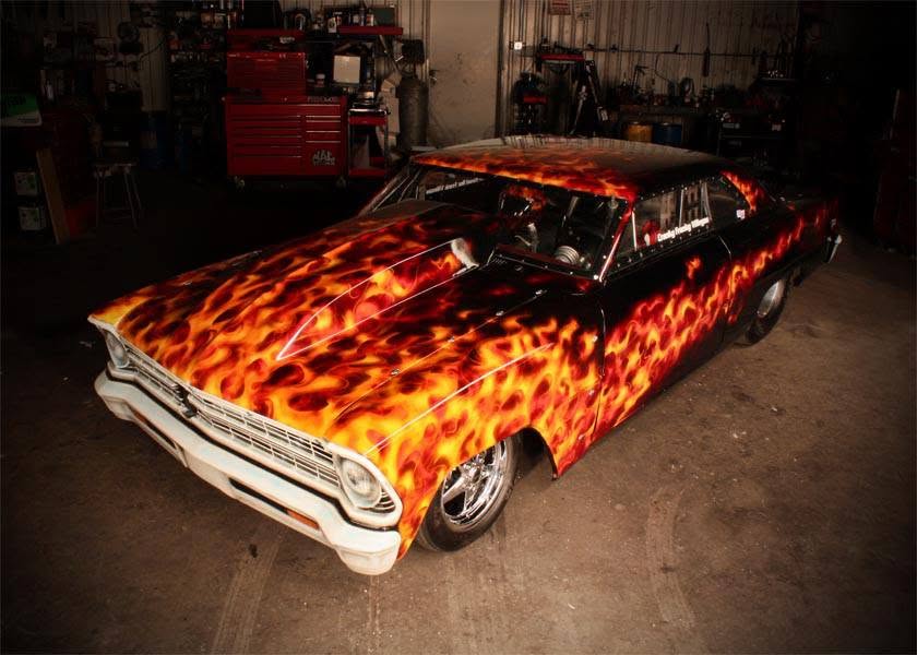 Low custom car with a vivid flame paint finish